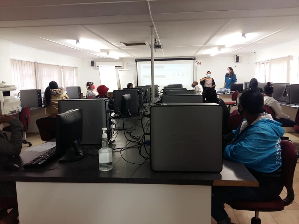 A busy computer literacy class session in Kleinmond